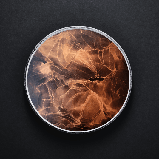 This original alcohol ink artwork features copper alcohol ink on round black synthetic paper.